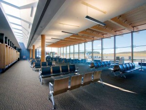 At Prince George, the double-glazed mullion-free structural glass airside façade is supported by sand-cast ductaline steel castings, which are mounted on the elliptically shaped glulam columns. Photo courtesy McFarlane Green Architecture & Design