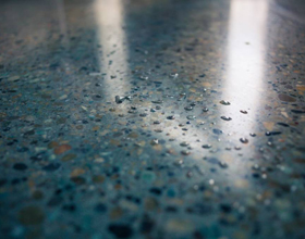 Filling the voids: Differentiating between concrete coating and polishing?