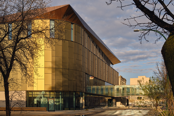 Shape-shifting BIPV panels form energy-efficient facade for Manitoba college