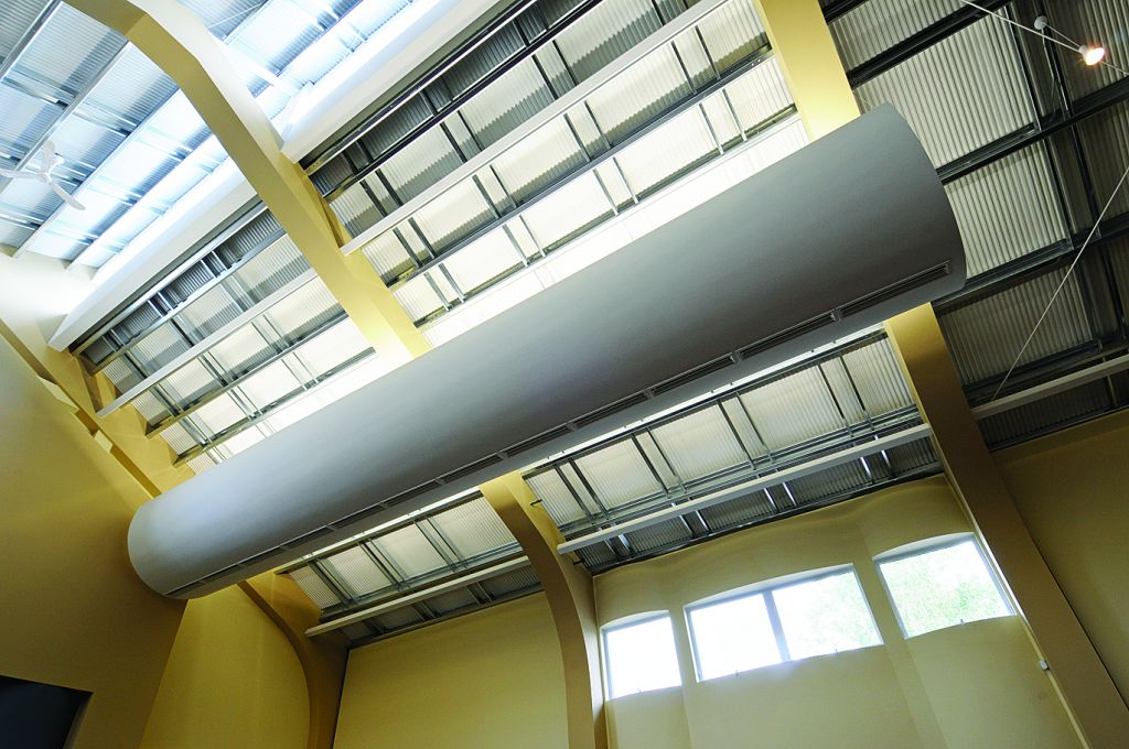 A modular framing system with acrylic-coated galvanized structural members was specified for its durability and low maintenance requirements.