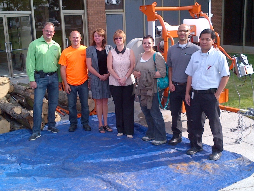 On July 26, a demonstration was held in Etobicoke to showcase how trees damaged by Emerald Ash Borers can be reused. From left to right, Weston Forest Product’s Steve Rhone, Sawmil Sid’s Sydney Sheila Gendron, Bentall Kennedy’s Linda Sketchley, Partners in Project Green’s Jaime Carnevale and Alex Dumesle, and Bentall Kennedy’s Rodrigo Llagas were part of the event. Photo courtesy Partners in Project Green