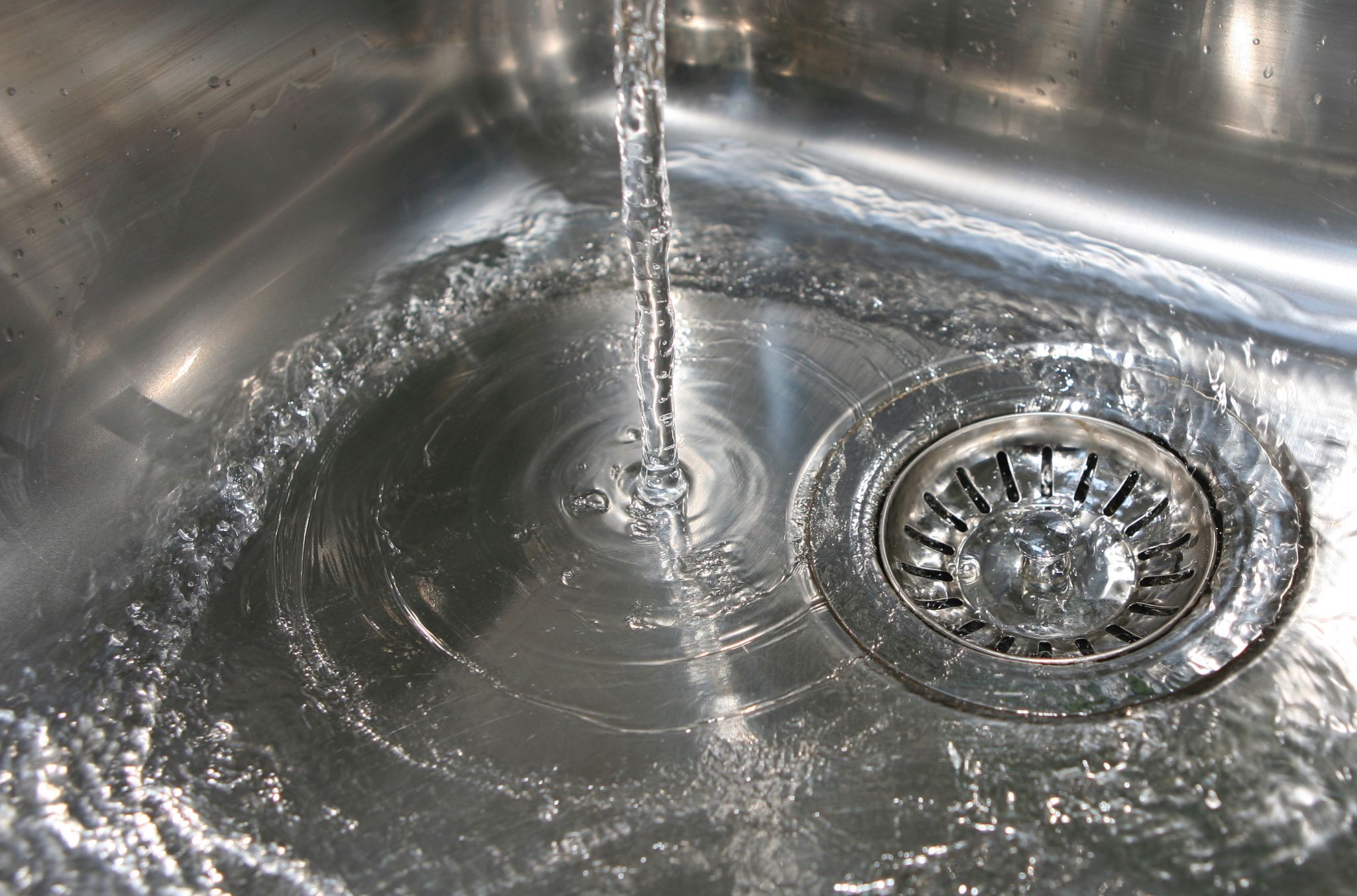 Sinks and faucets can be found in virtually all residential and commercial buildings. To achieve a strategy of adopting low-lead criteria into model codes, the Canadian Standards Association (CSA) created a task force to work on adopting similar specifi cations as the United States. Photo © BigStock/Joseph Gough