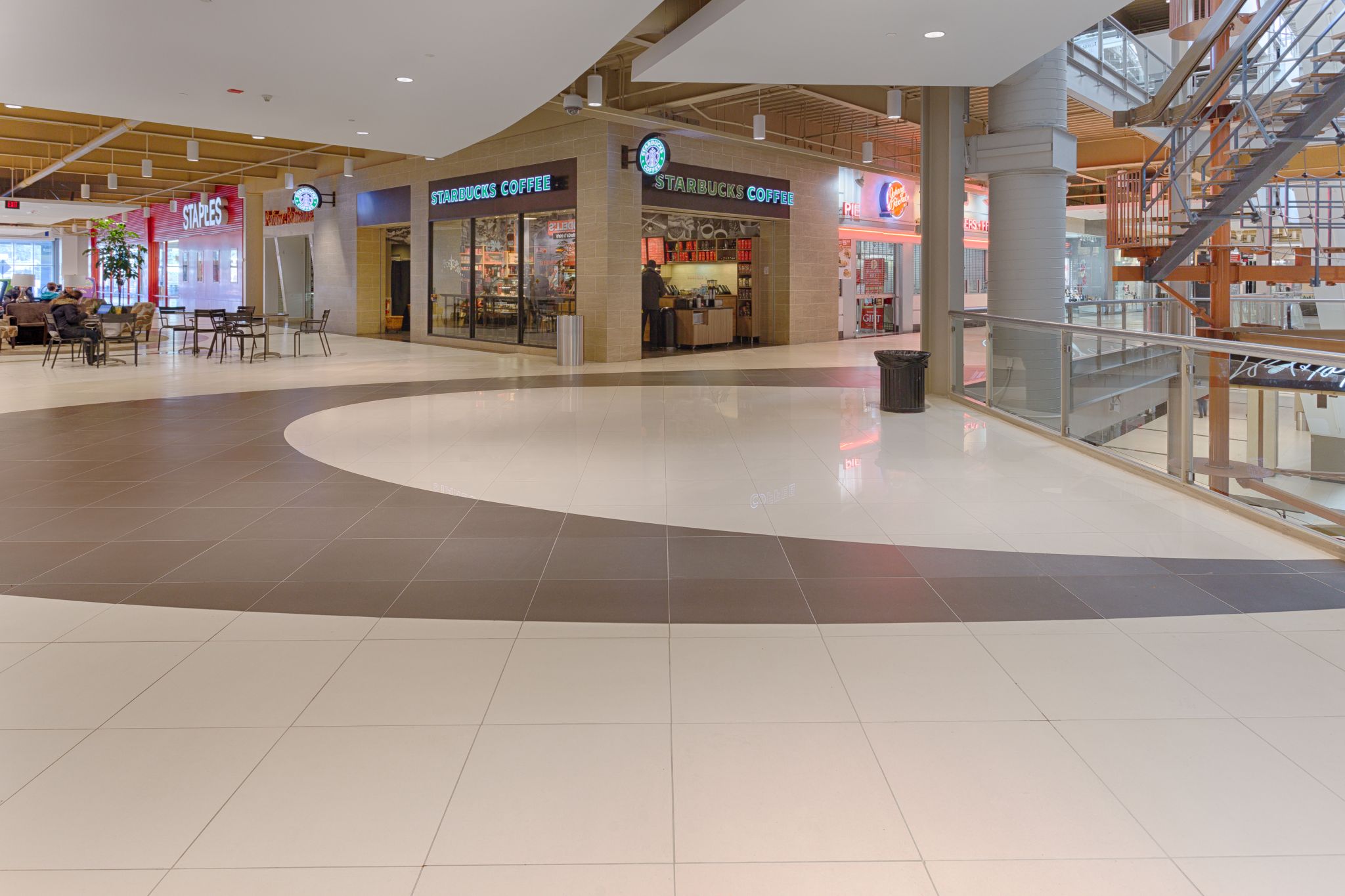 High-traffic areas, such as shopping malls, demand extensive planning and consultation, as well as proper mortar selection when installing large format tile. Photos courtesy Custom Building Products