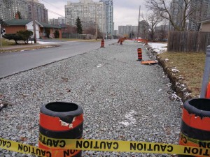 Grading: a sub-base for permeable pavement lay-by and sidewalk.