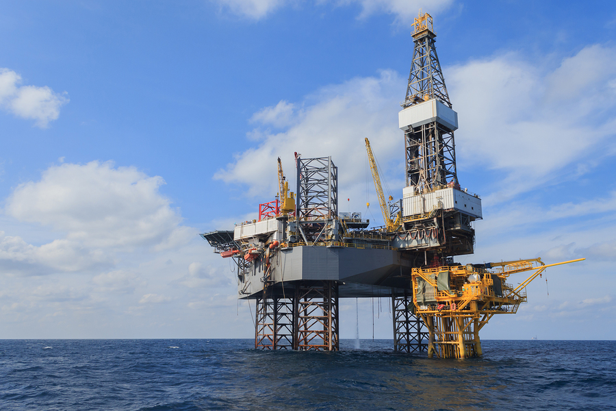 Offshore Jack Up Drilling Rig Over The Production Platform In Th