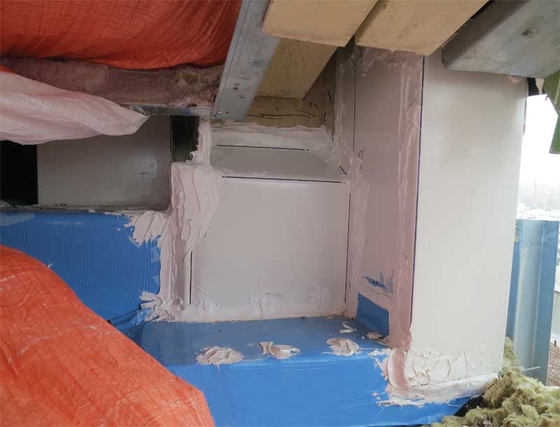 After: Sheet metal (shown in white) and sealant can be an option to address such complex tie-in details. Care must be taken when using metal to prevent new issues such as thermal bridging.