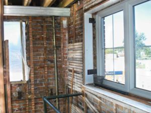 Condition of the masonry walls.
