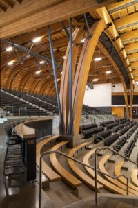 In the arena, thoughtfully designed 3D timber/steel trusses, meticulously proportioned, extend over a length of (45.7 m) 150 ft, reaching a distinctive timber portal frame arch that gracefully delineates the intimate space within the arena.