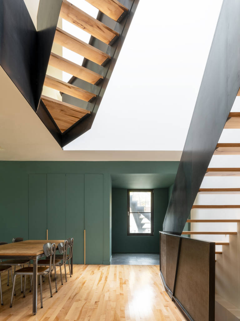 Sculptural staircase becomes focal point in unconventional Montreal ...