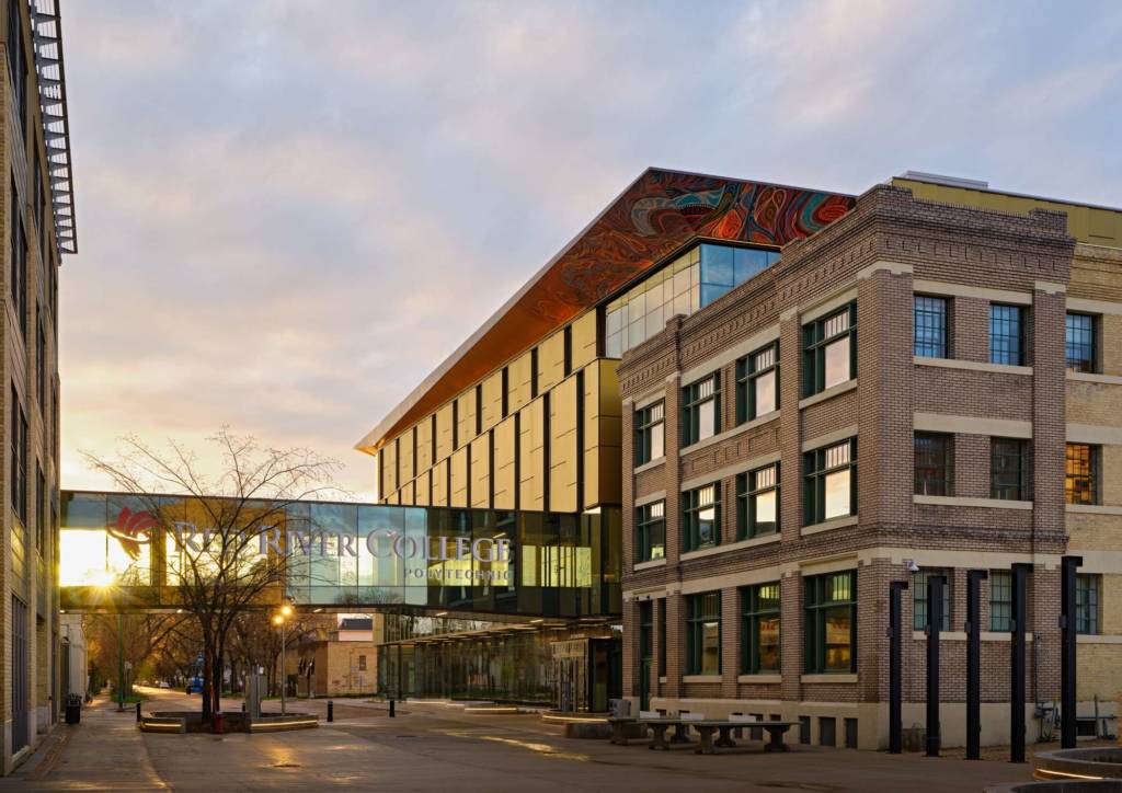 The photo shows the newly built addition standing adjacent to the renovated heritage building.