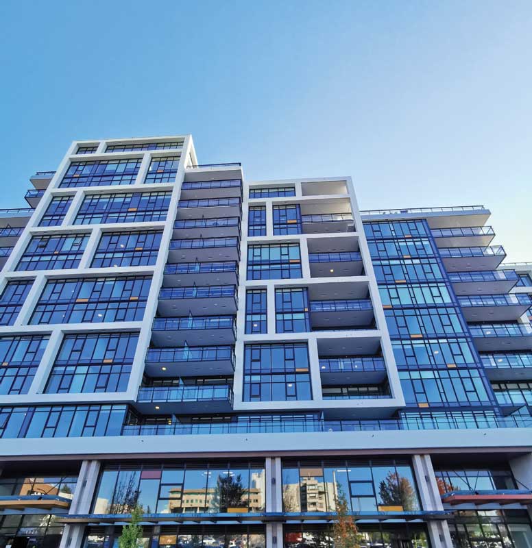 Aluminum-framed curtain wall, windows, and terrace doors were specified for this 12-storey, 126-unit, mixed-use residential development.