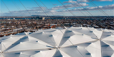 stadium roof structure held with cables from the outside