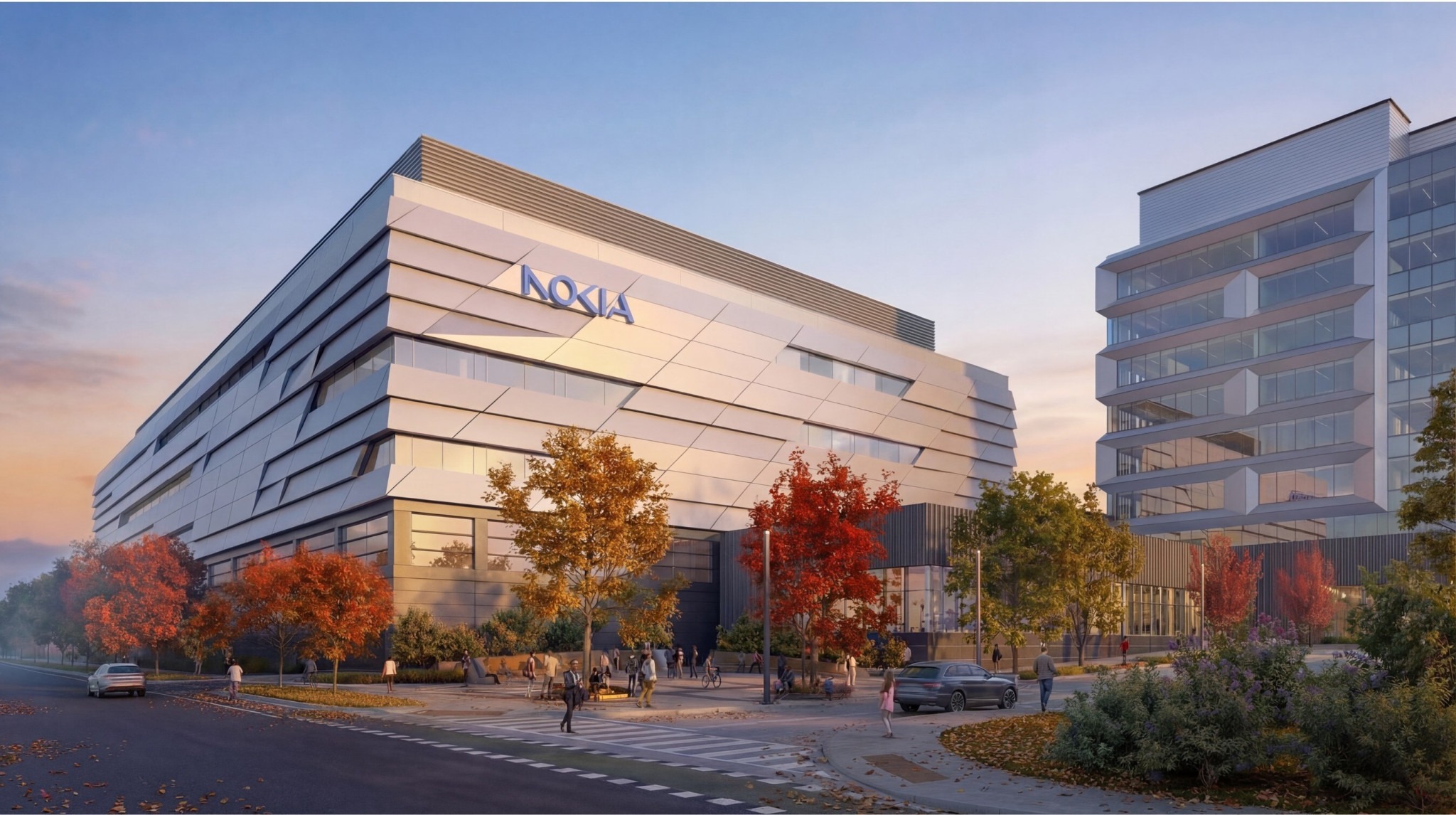 Modern building with Nokia logo, featuring geometric design and large windows, surrounded by autumn trees at sunset, evoking a calm, innovative atmosphere.