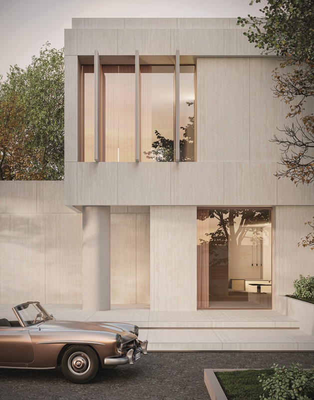 Modern minimalist house with large windows and beige facade, flanked by trees. A vintage convertible car is parked in front, creating a tranquil, elegant scene.